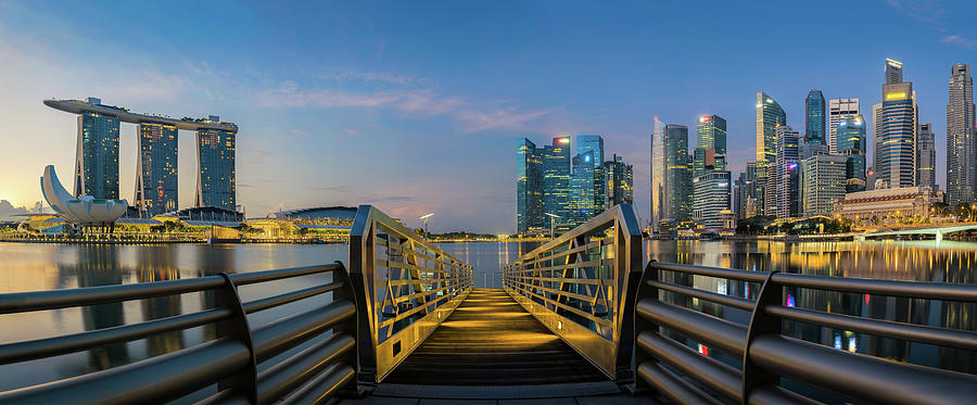 Sunrise and bridge in Singapore City Photograph by Anek Suwannaphoom