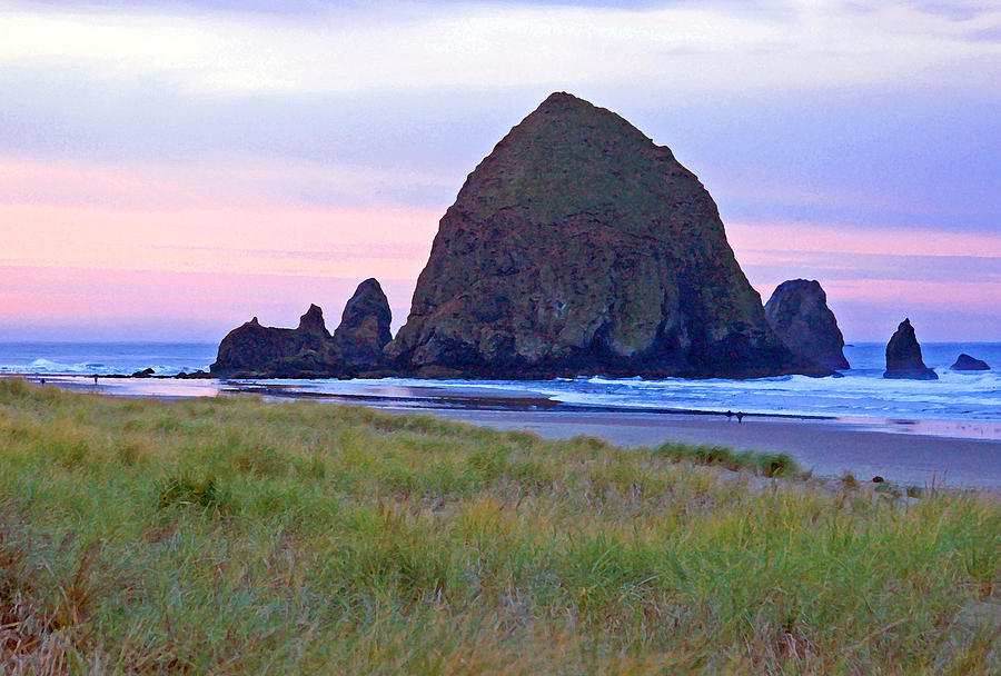 Sunrise at Cannon Beach  Haystack Rock and the Needles Photograph by Margaret Hood