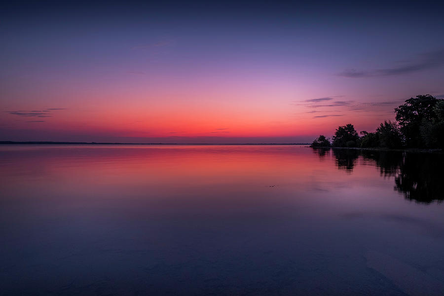 Sunrise at Chaumont Bay Photograph by Ron Biedenbach