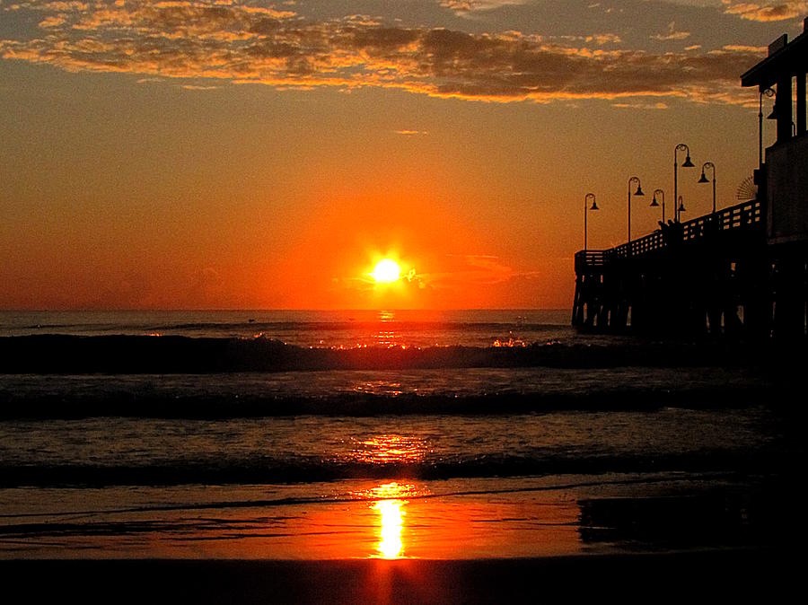 Sunrise at Daytona Beach Pier  003 Photograph by Christopher Mercer