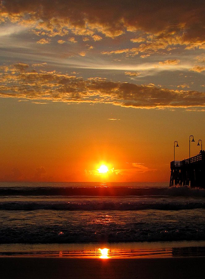 Sunrise at Daytona Beach Pier  005  Photograph by Christopher Mercer