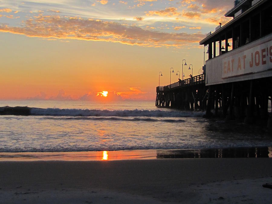 Sunrise at Daytona Beach Pier  Photograph by Christopher Mercer