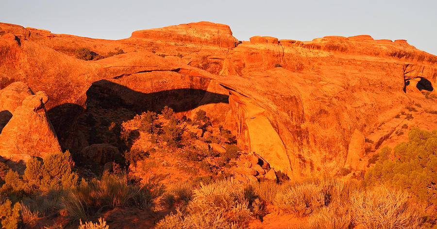 Sunrise at Landscape arch in Arches National Park Photograph by Pierre Leclerc Photography