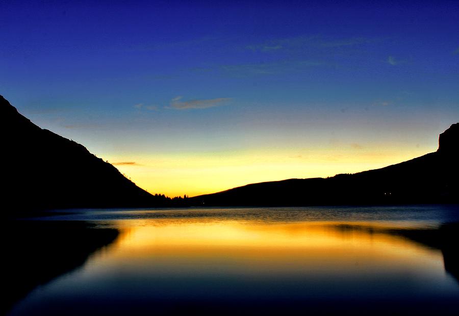 Sunrise at Many Glacier Lodge Photograph by Matthew Winn