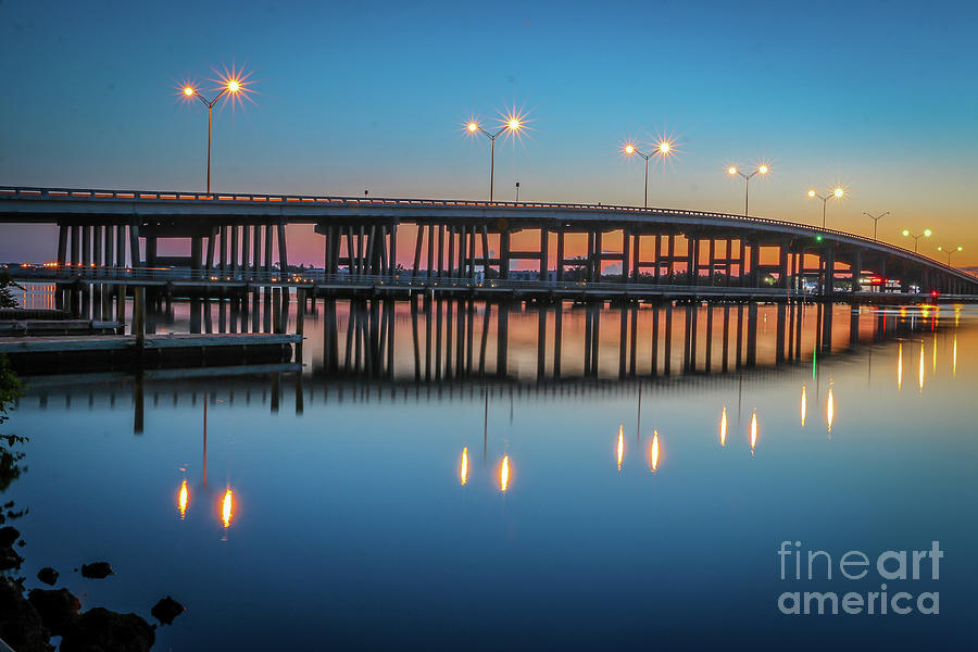 Sunrise at Palm City Bridge Photograph by Tom Claud