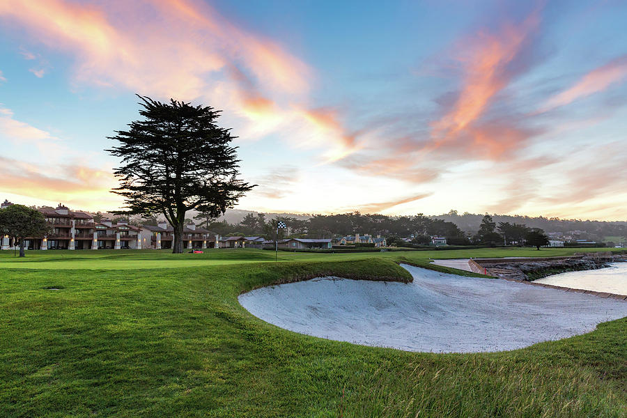 Sunrise at Pebble Beach Golf Course Photograph by Mike Centioli
