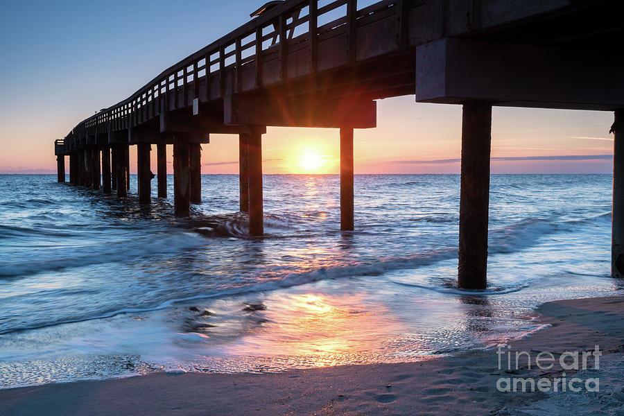 Sunrise at St. Augustine Beach Pier, Florida Photograph by Dawna Moore Photography