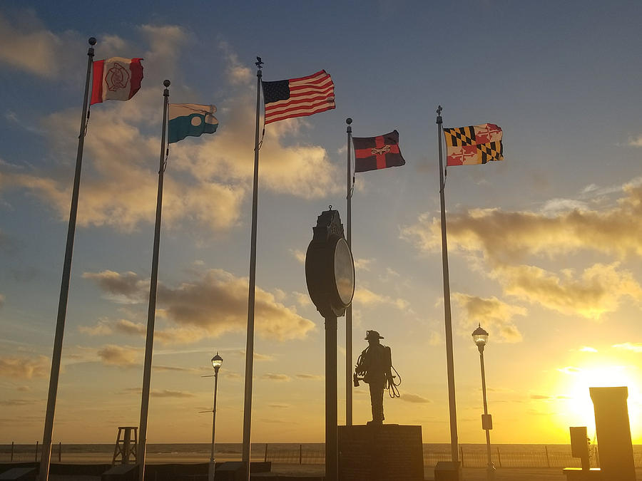 Sunrise at the Firefighter Memorial Photograph by Robert Banach