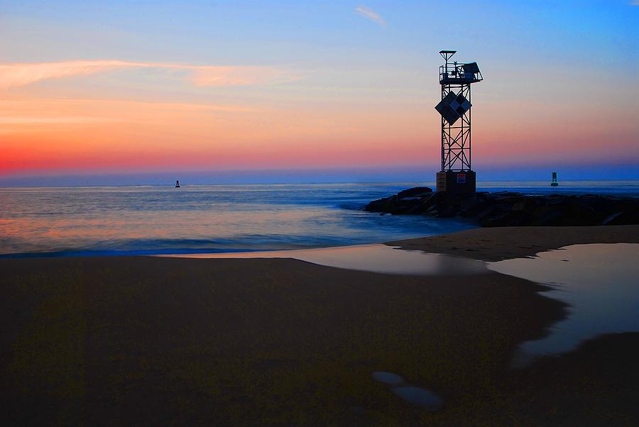 Sunrise coming at Ocean City inlet Photograph by Bill Jonscher