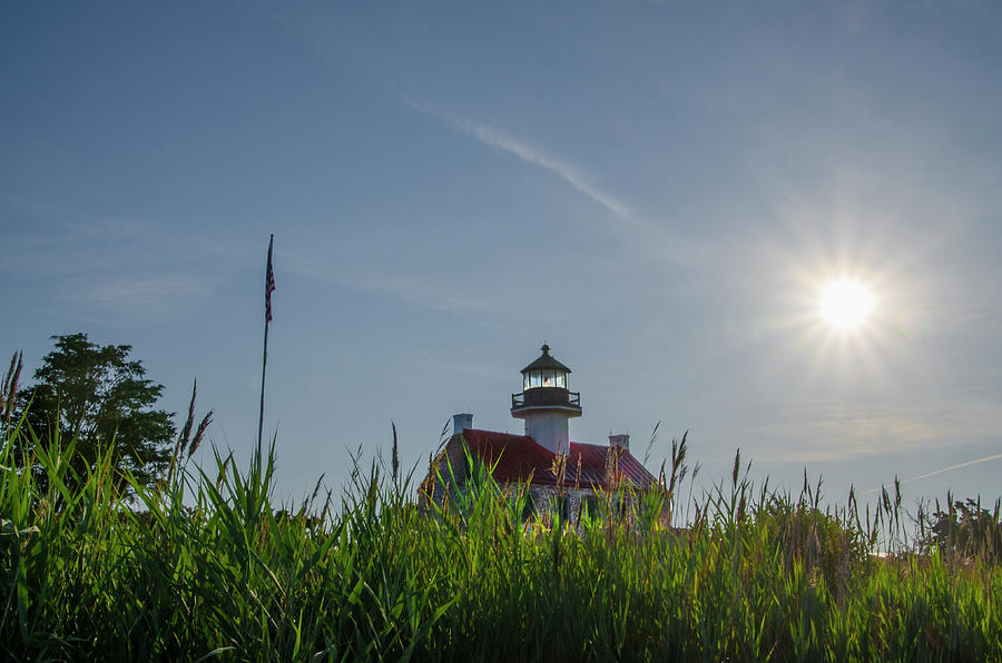 Sunrise Coming Up over East Point Lighthouse Photograph by Bill Cannon