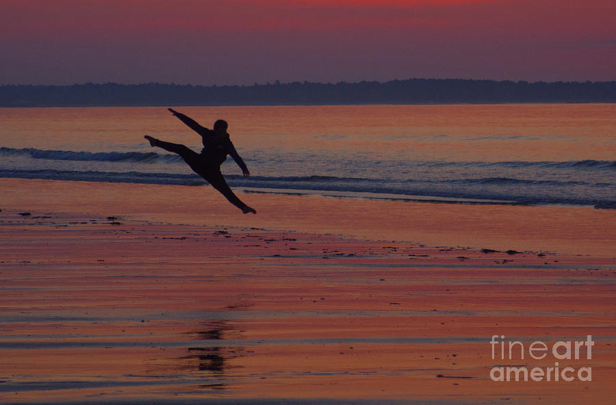 Beach Photograph - Sunrise Leap by Ray Konopaske
