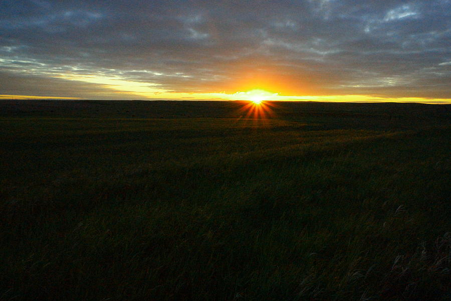 Sunrise on a North Dakota field Photograph by Jeff Swan