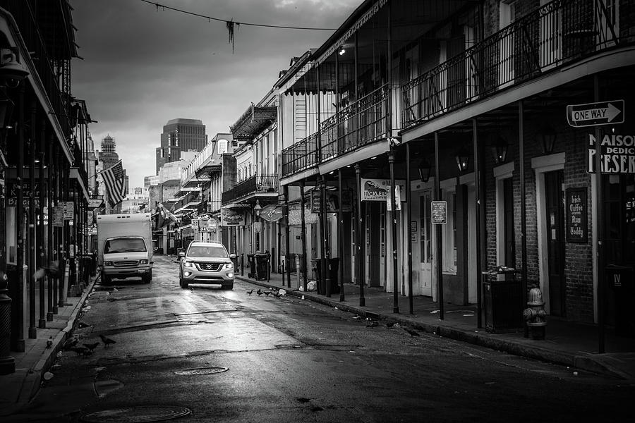Sunrise On Bourbon Street In Black and White Photograph by Greg and Chrystal Mimbs