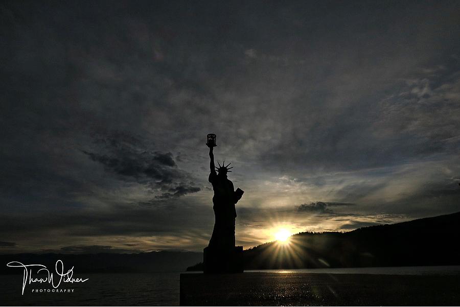Sunrise On Liberty Photograph