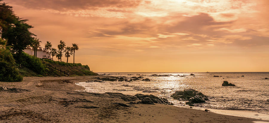 Sunrise on the beach at La Cala, Spain Photograph by Peter Hayward ...