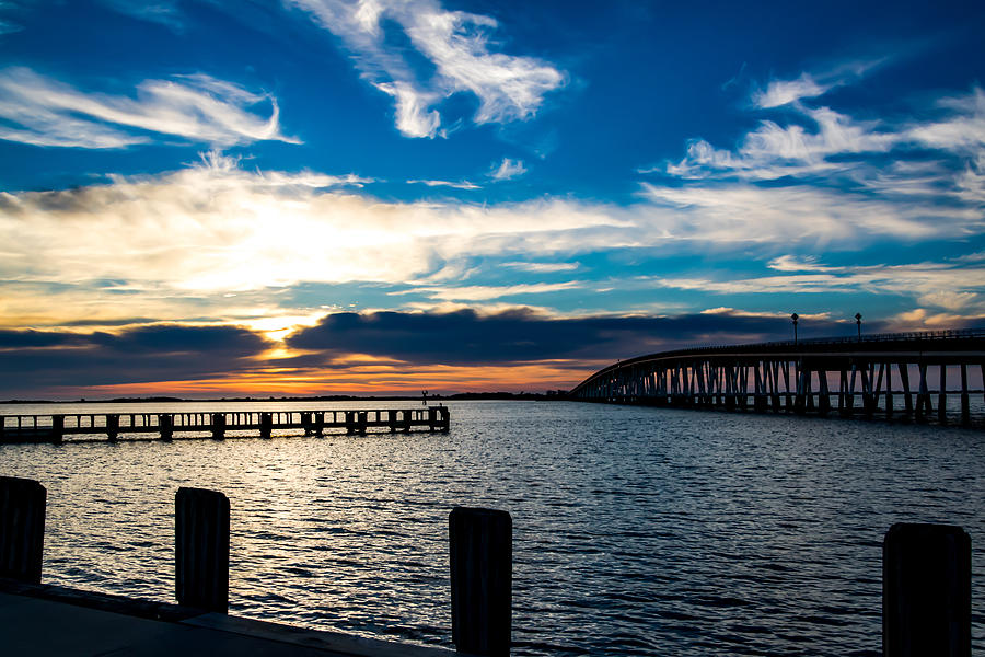 Sunrise over Assateague Island Bridge Photograph by Carol Ward - Pixels