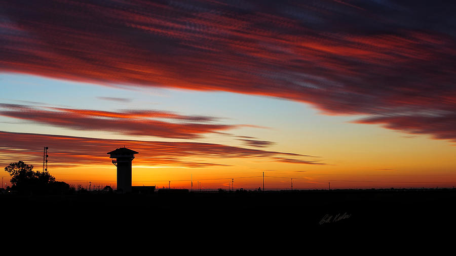 Sunrise Over Golden Spike Tower Photograph by Bill Kesler