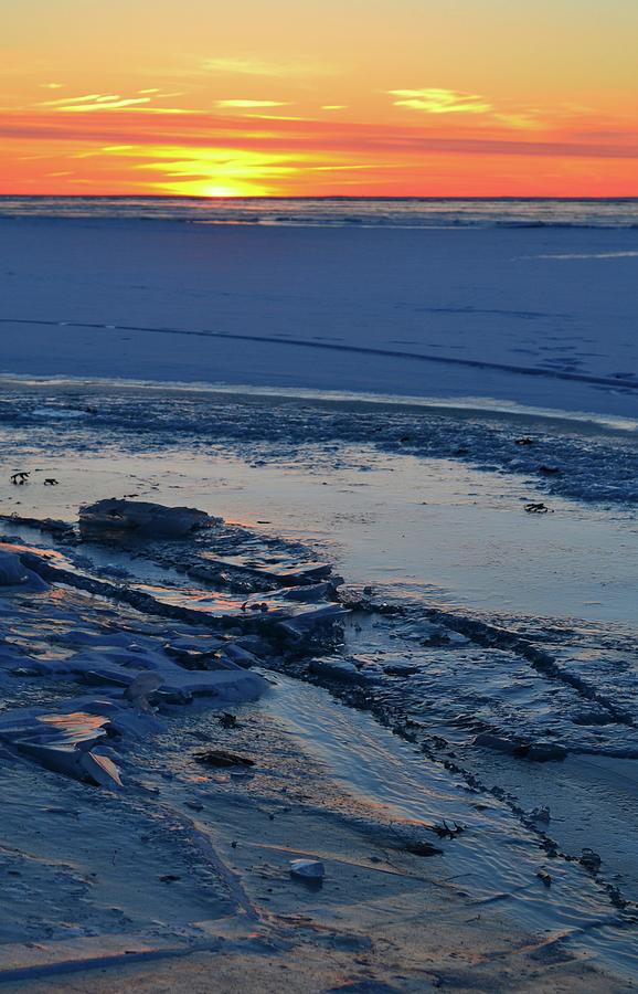 Sunrise Over Ice  Photograph by Lyle Crump