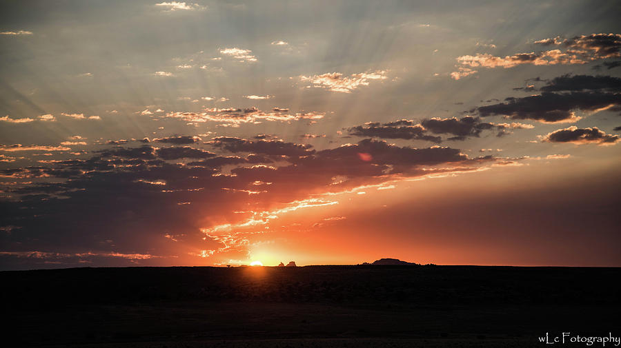 Sunrise Over Moah, UT Photograph by Wendy Carrington