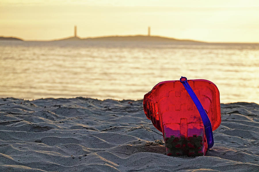 Sunrise over Thacher Island from Long Beach in Gloucester MA Sand Bucket Photograph by Toby McGuire