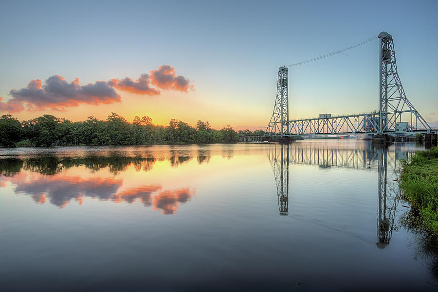 Sunrise over The Neches River In Beaumont Photograph by JC Findley