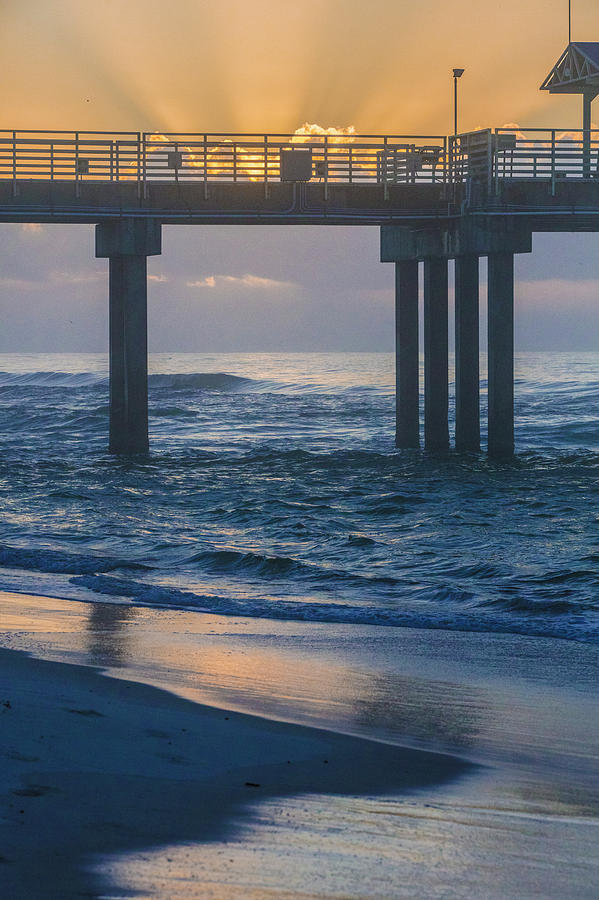 Sunrise over the Pier Photograph by John McGraw