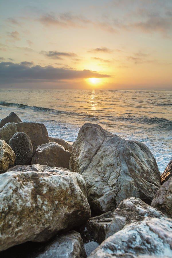 Sunrise over the rocks  Photograph by John McGraw