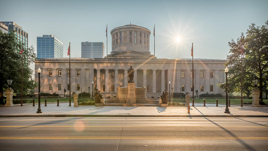 Sunrise over the Statehouse Photograph by Keith Allen