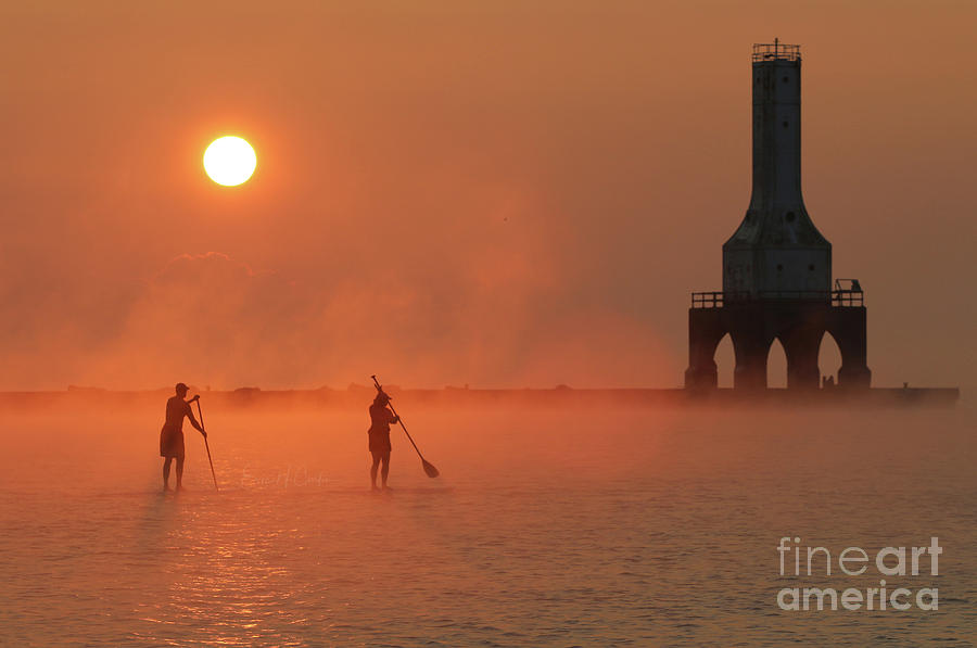Sunrise paddle boarding  Photograph by Eric Curtin
