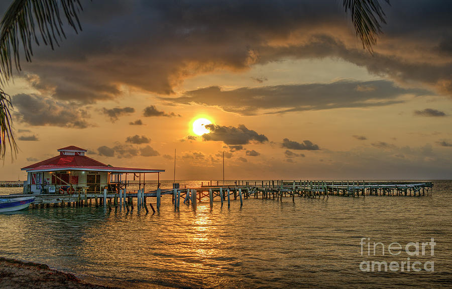 Sunrise Pier over Water Photograph by David Zanzinger