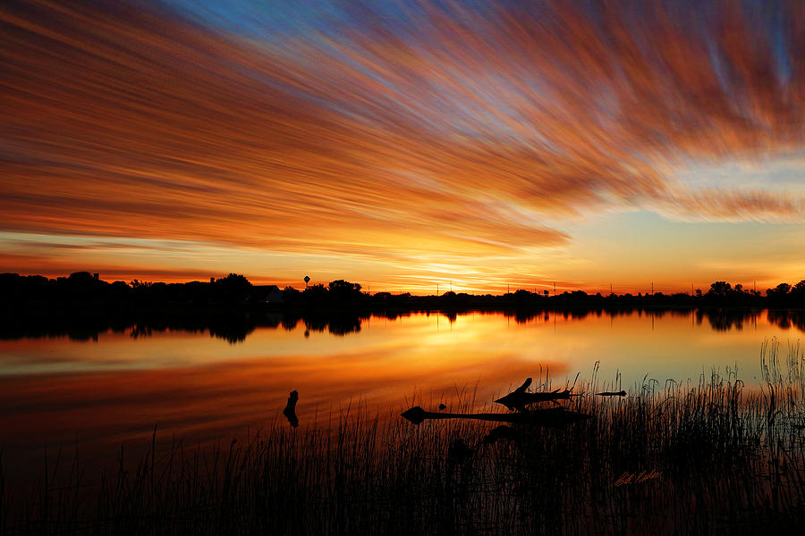 Sunrise Reflected Photograph by Bill Kesler