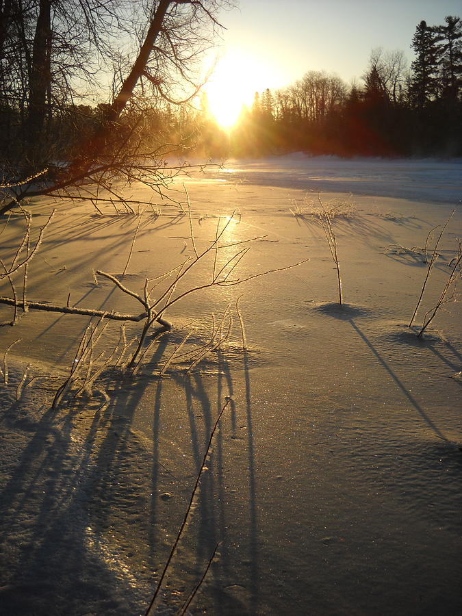 Sunrise Reflecting off Mississippi River Ice Photograph by Kent Lorentzen