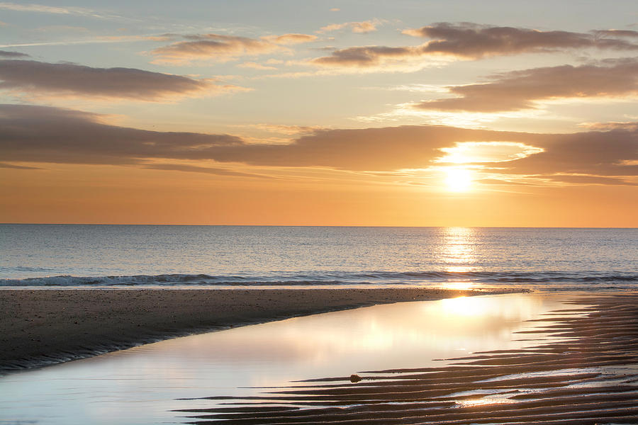 Sunrise Reflections at Aberdeen Beach Photograph by Veli Bariskan
