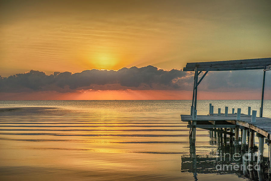Sunrise Ripples on the Sea Photograph by David Zanzinger