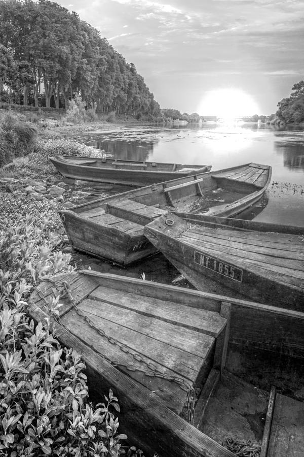 Sunrise Rowboats  in Black and White Photograph by Debra and Dave Vanderlaan