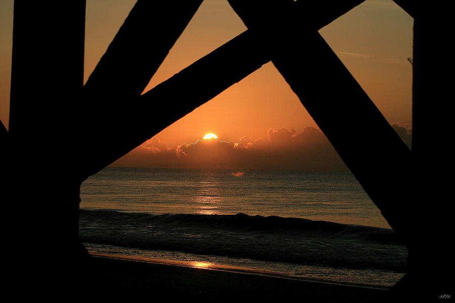 Sunrise Under The Pier Photograph by Jason Blalock