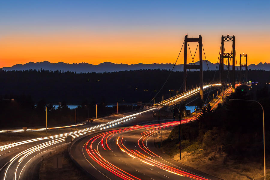 Sunset and Streaks of Light - Narrows Bridges Tacoma WA Photograph by Rob Green