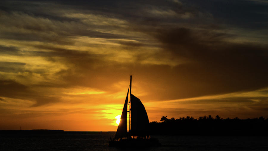 Sunset and the Sailboat Photograph by Srinivasan Venkatarajan