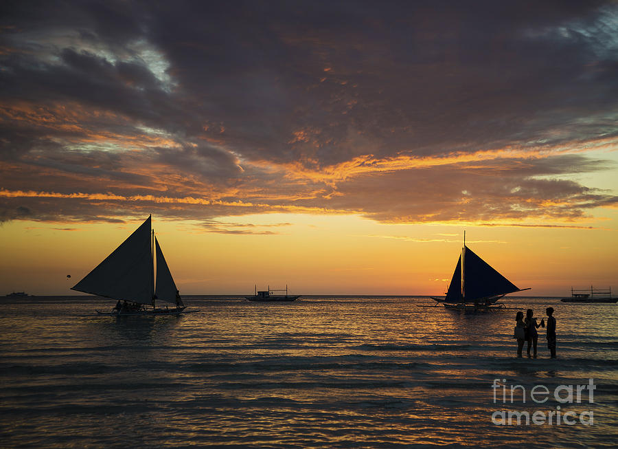 Sunset And Tourist Sailing Boats On Tropical White Beach In Bora Photograph by JM Travel Photography
