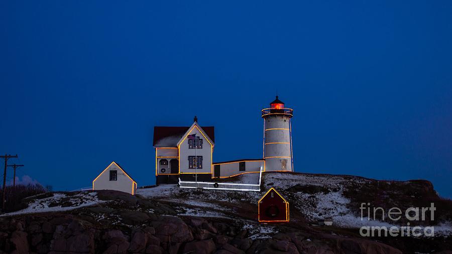 Sunset at Cape Neddick/Nubble Light. in York, Maine. Photograph by New England Photography