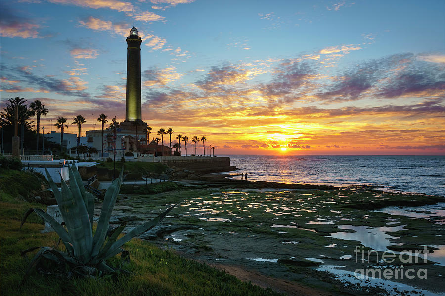 Sunset at Chipiona Lighthouse Cadiz Spain Photograph by Pablo Avanzini