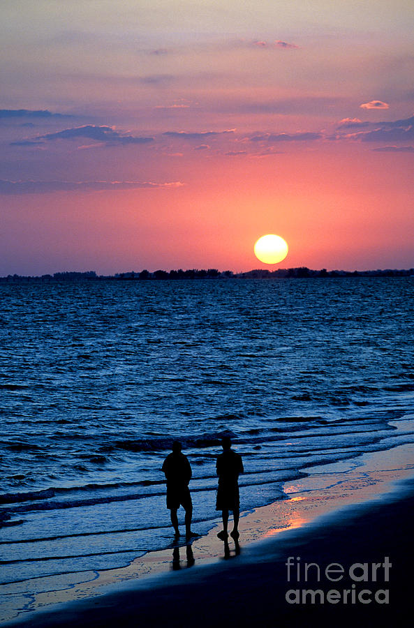 Sunset at Fort Myers Beach on the Gulf of Mexico Photograph by William Kuta