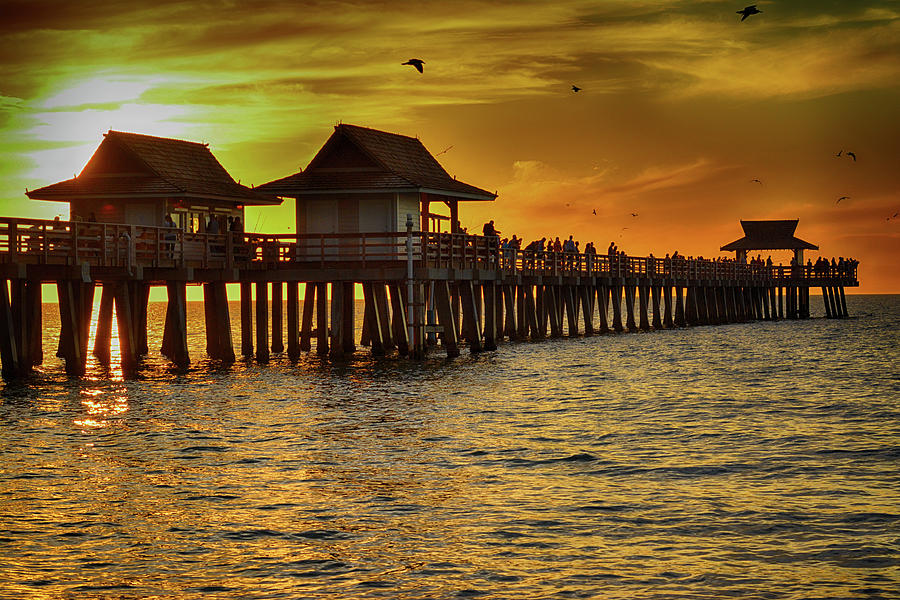 Sunset at Naples Pier Photograph by Don Columbus