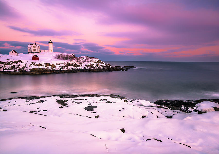 Sunset at Nubble Lighthouse in Maine in Winter Snow Photograph by Ranjay Mitra