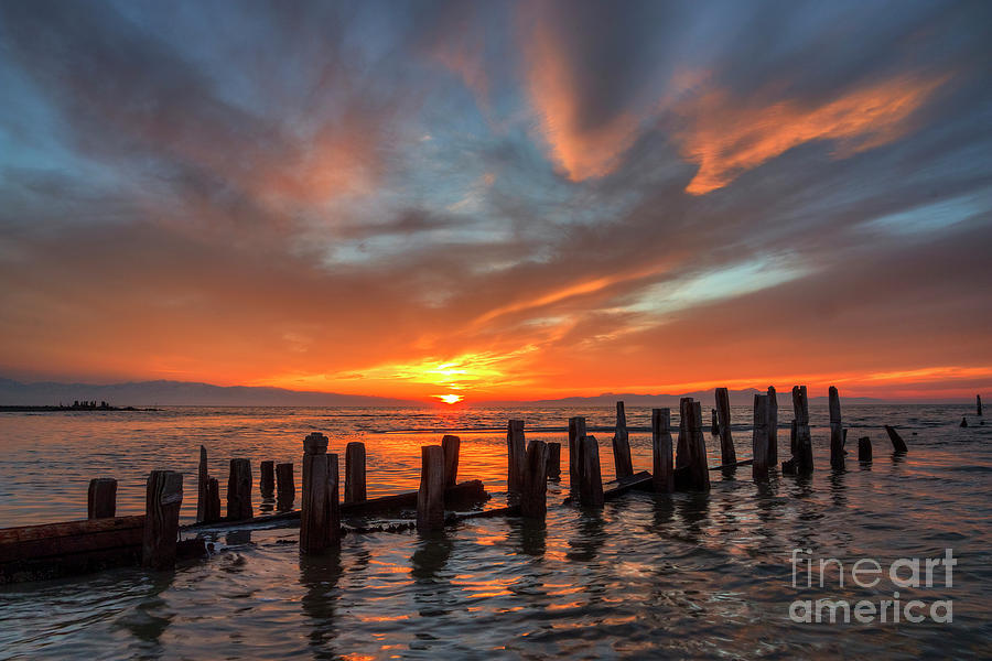 Sunset at old Saltair piers Photograph by Spencer Baugh