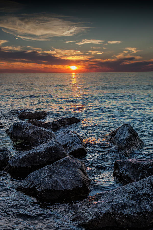 Sunset at Ottawa Beach from the Channel Rocks Photograph by Randall Nyhof