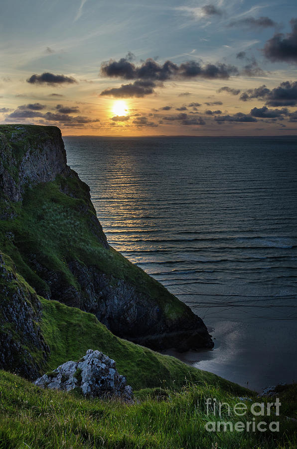 Sunset at Rhossili Bay Photograph by Perry Rodriguez