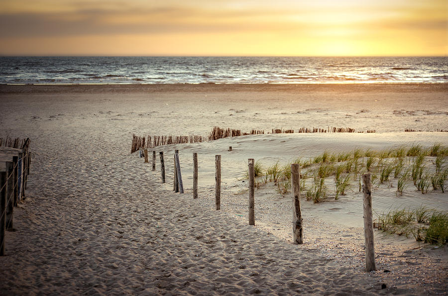 Sunset At The Beach Photograph by Hannes Cmarits