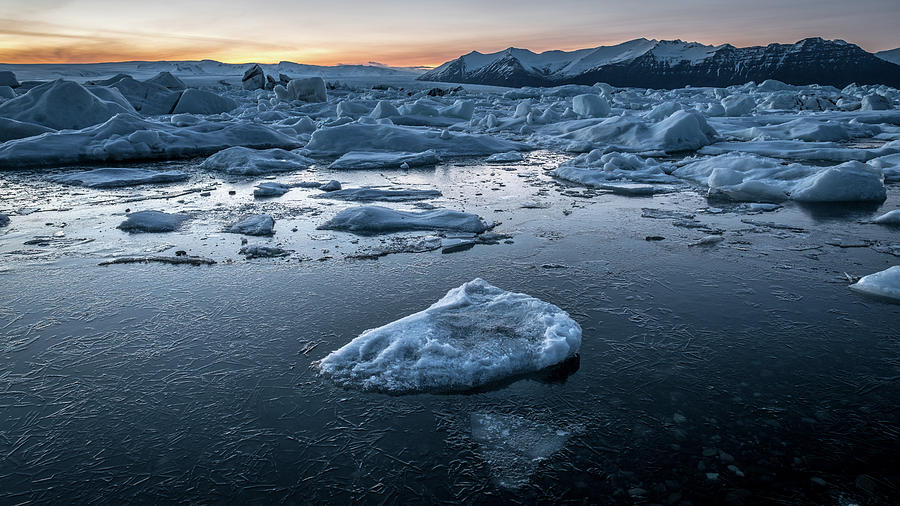 Sunset at the Glacier Lagoon - Iceland - Travel photography Photograph by Giuseppe Milo