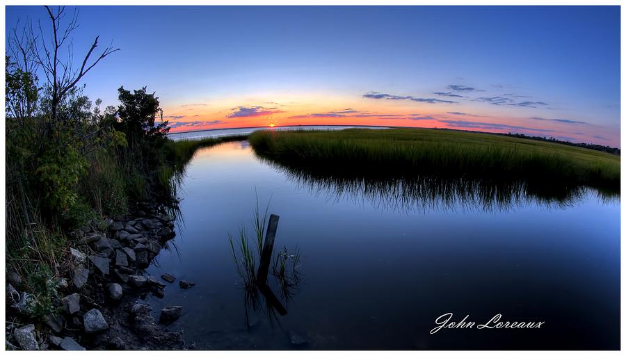 Sunset at The Landing Photograph by John Loreaux